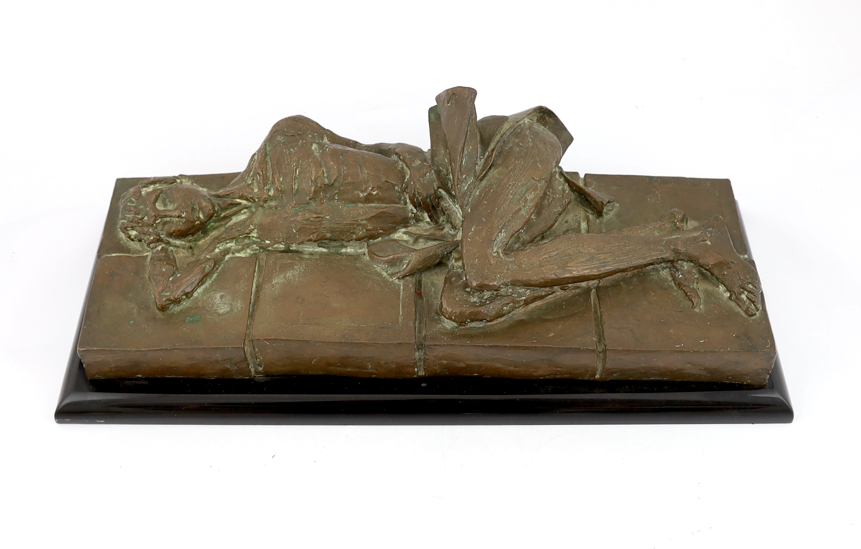 Nicola Simbari (Italian, 1927-2012), a bronze 'Reclining woman', 52.5cm wide, 18cm deep, 16cm high, on a black plinth